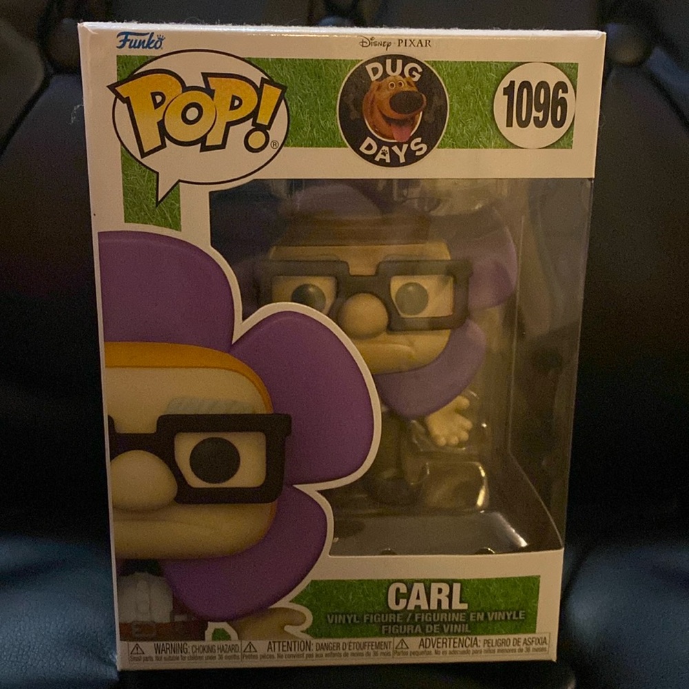 Funko pop of Carl with flower